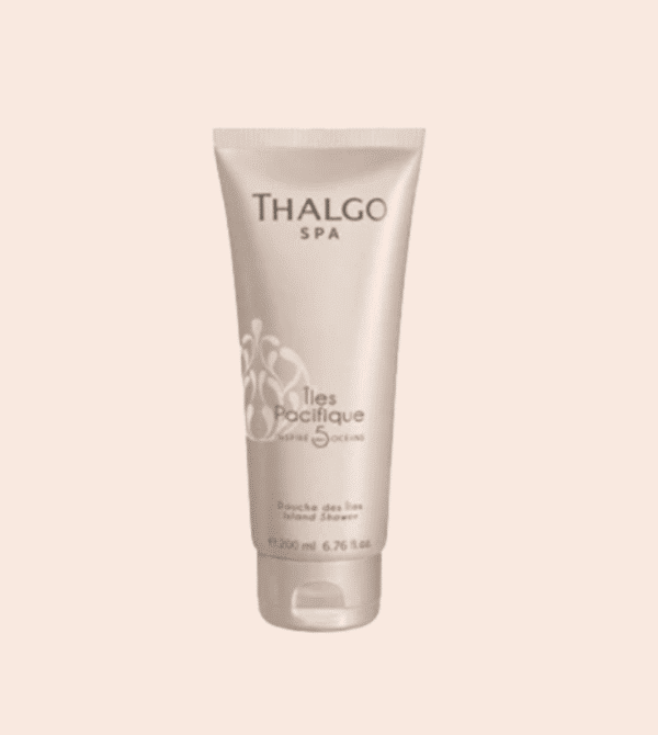 Tube de douche des îles de Thalgo en plastique orange, sur fond orange